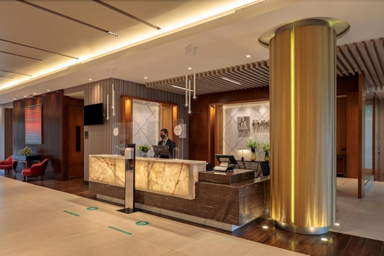 홀리데이 인 키토 에어포트 호텔 타바벨라 외부 사진 The lobby of the hotel